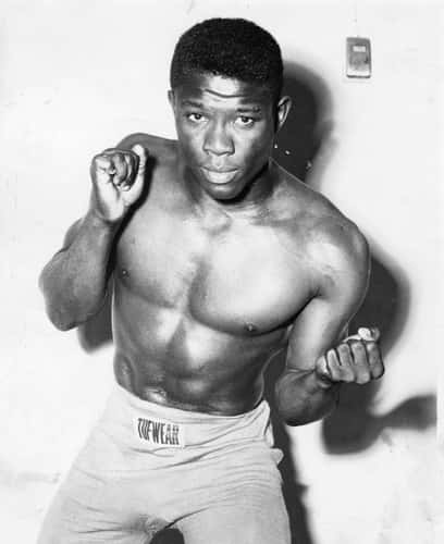 Emile Griffith Leaning Forwards Background