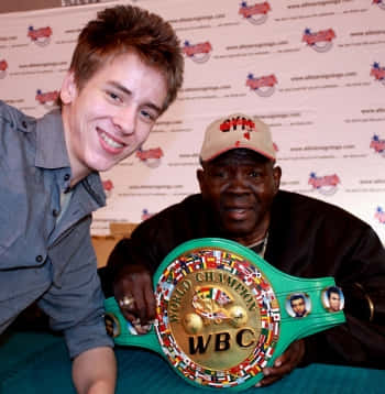 Emile Griffith Smiling With Fan Background