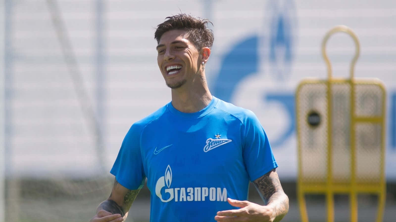 Emiliano Rigoni Smiling During Training Background