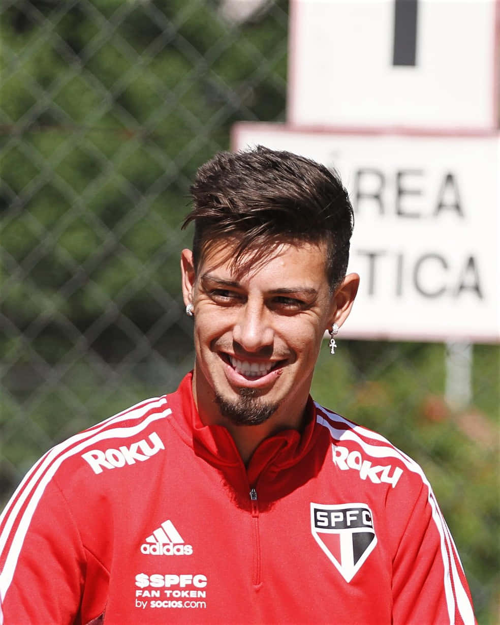 Emiliano Rigoni Smiling During Training Background