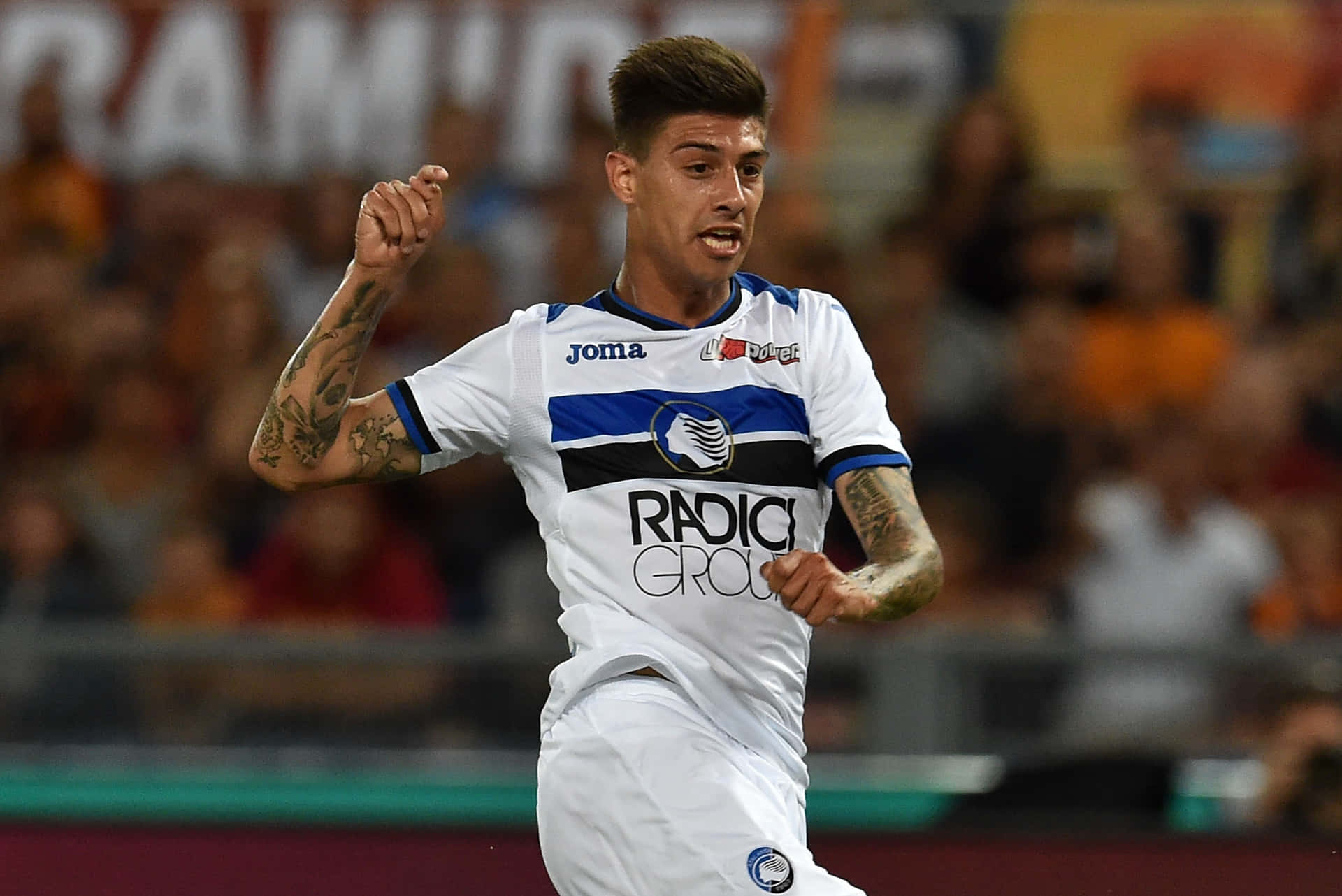 Emiliano Rigoniin Action Background