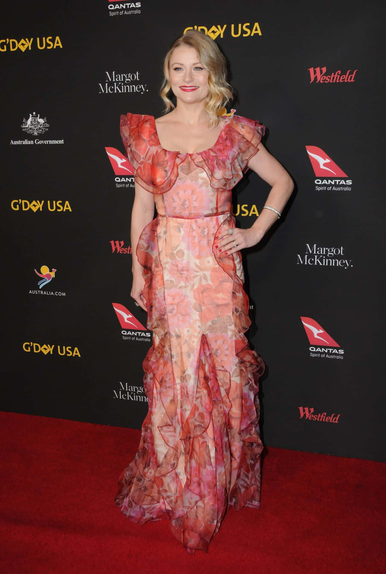 Emilie De Ravin Red Carpet Floral Gown Background