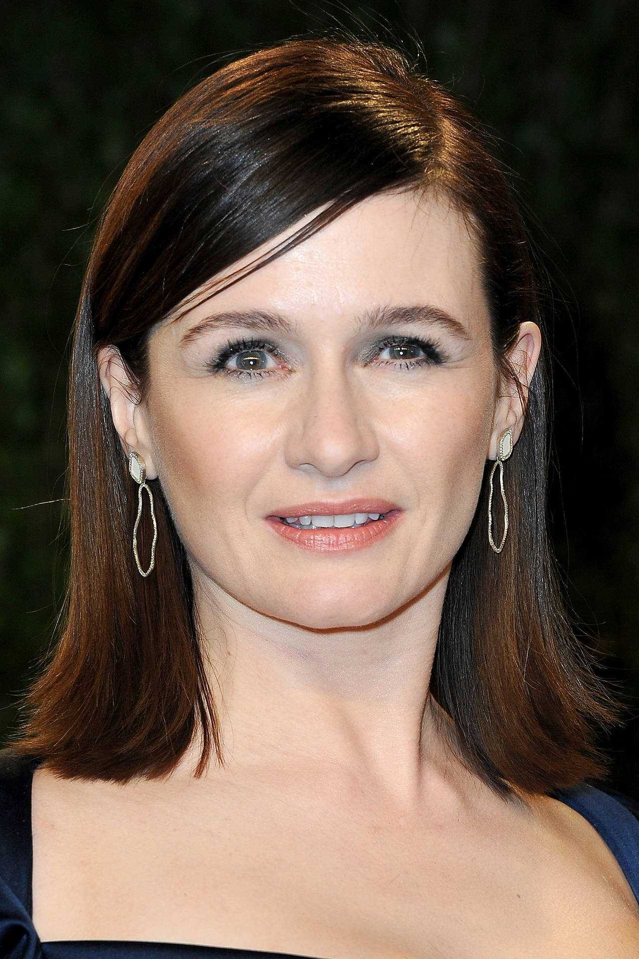 Emily Mortimer In A Portrait Photoshoot Background