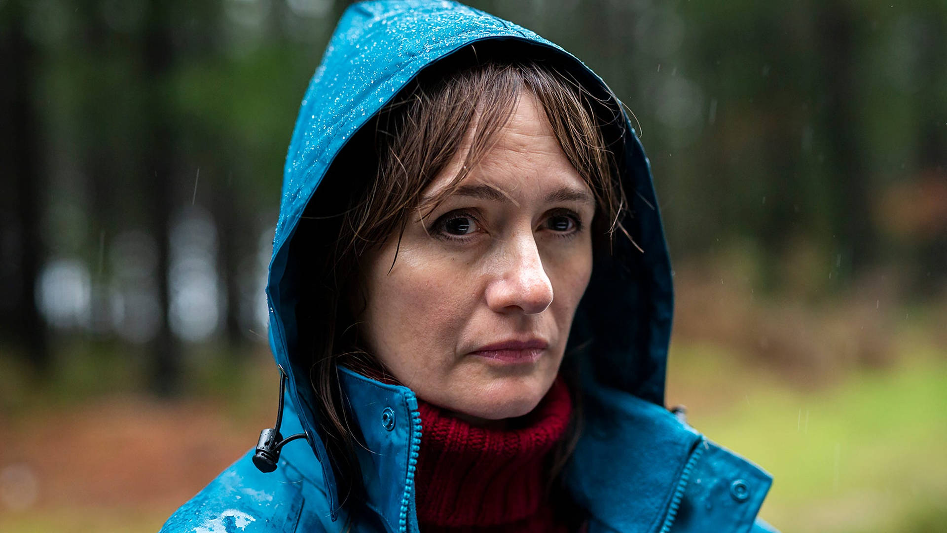 Emily Mortimer In Blue Jacket Background