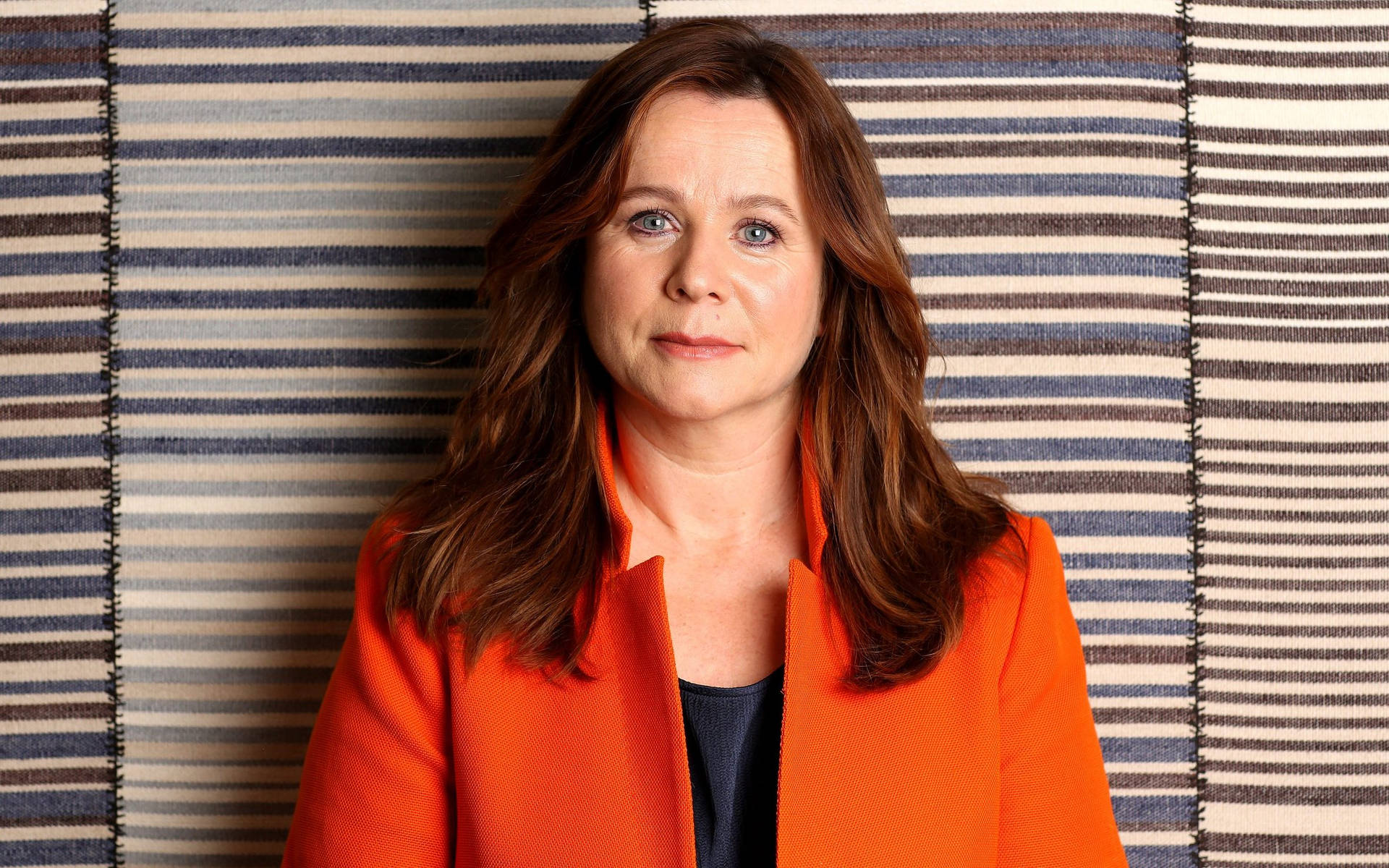 Emily Watson In A Red Outfit Background