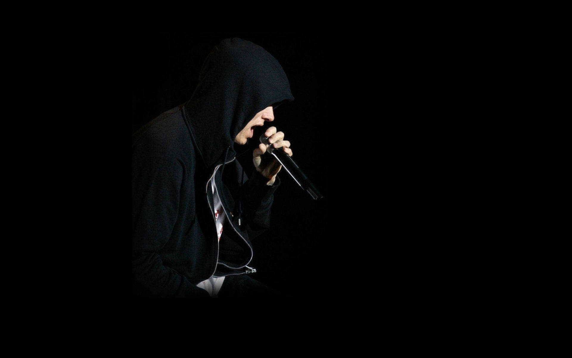 Eminem Rapping In Black Hoodie Background