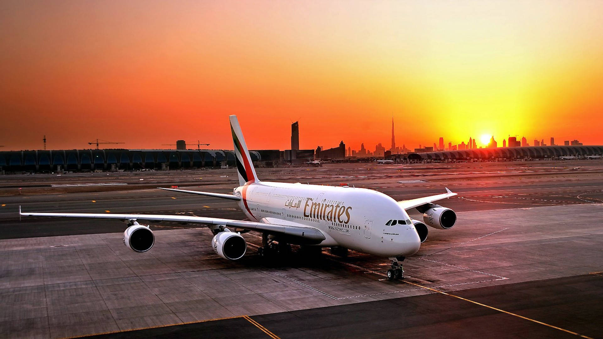 Emirates Airplane At The Airport Background