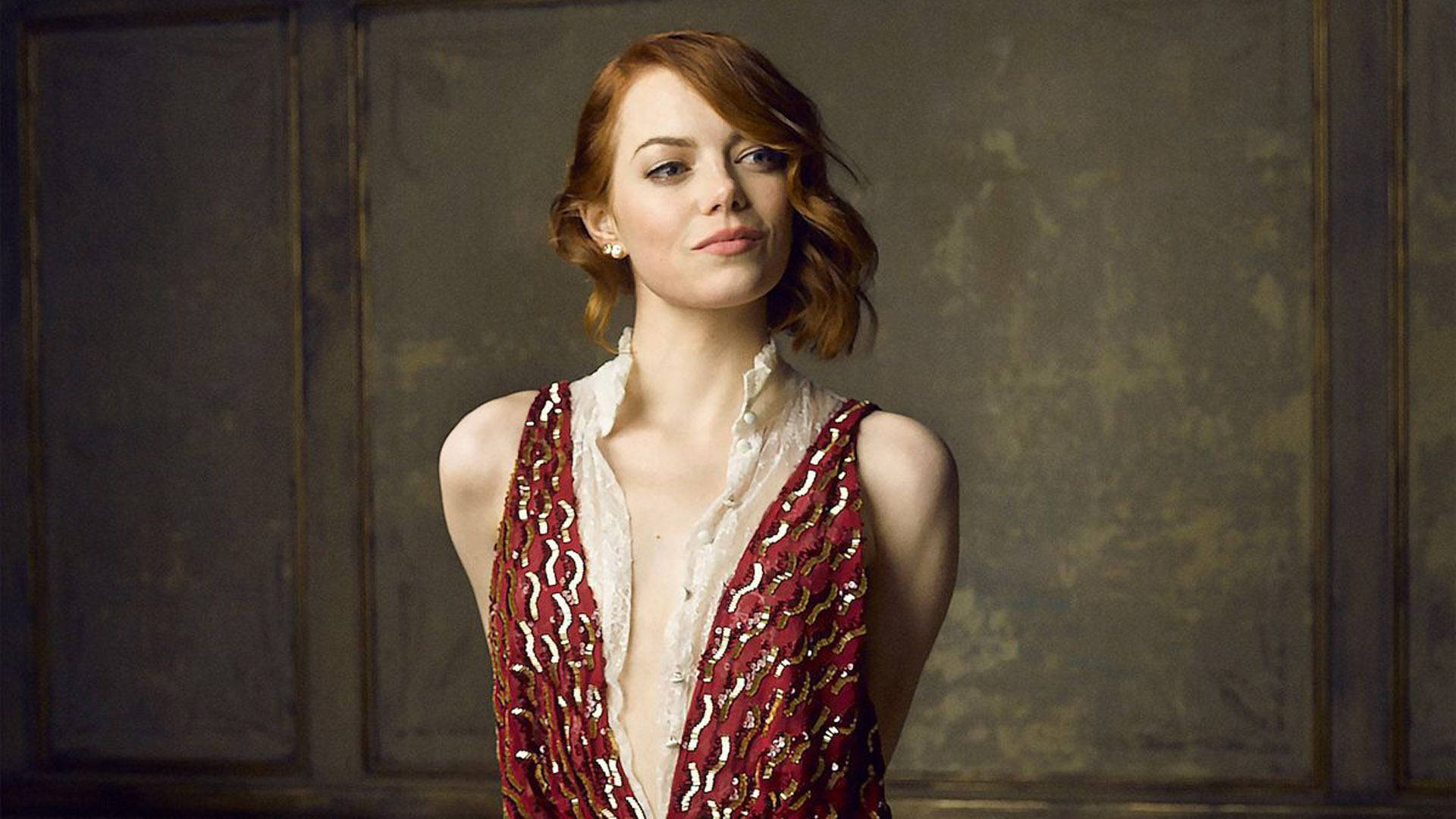 Emma Stone In A Classic Pose Background