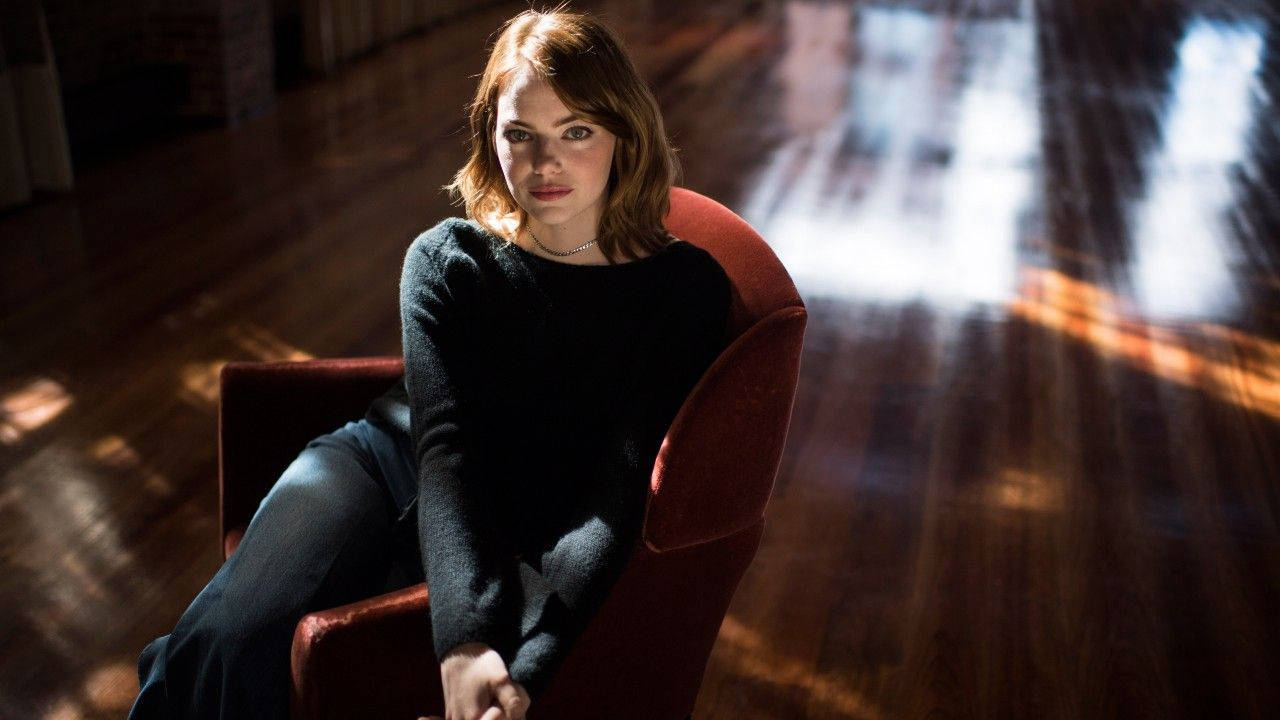 Emma Stone In Captivating Lighting Background