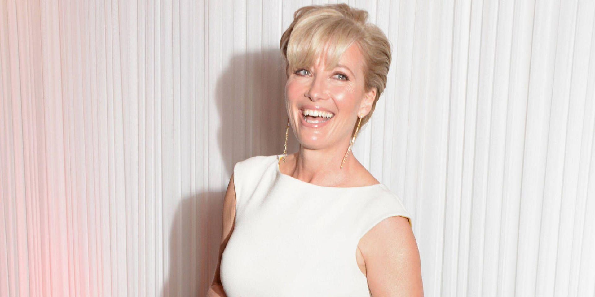 Emma Thompson In White Outfit Background