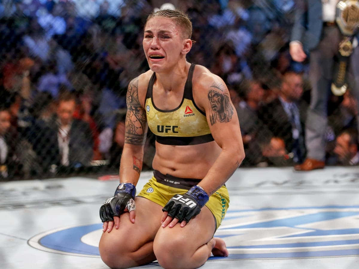 Emotional Moment Of Jéssica Andrade In The Octagon Background
