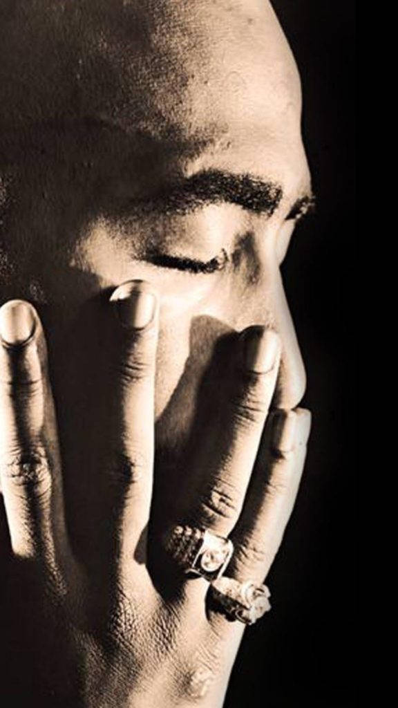 Emotive Portrait Of 2pac Shakur Background