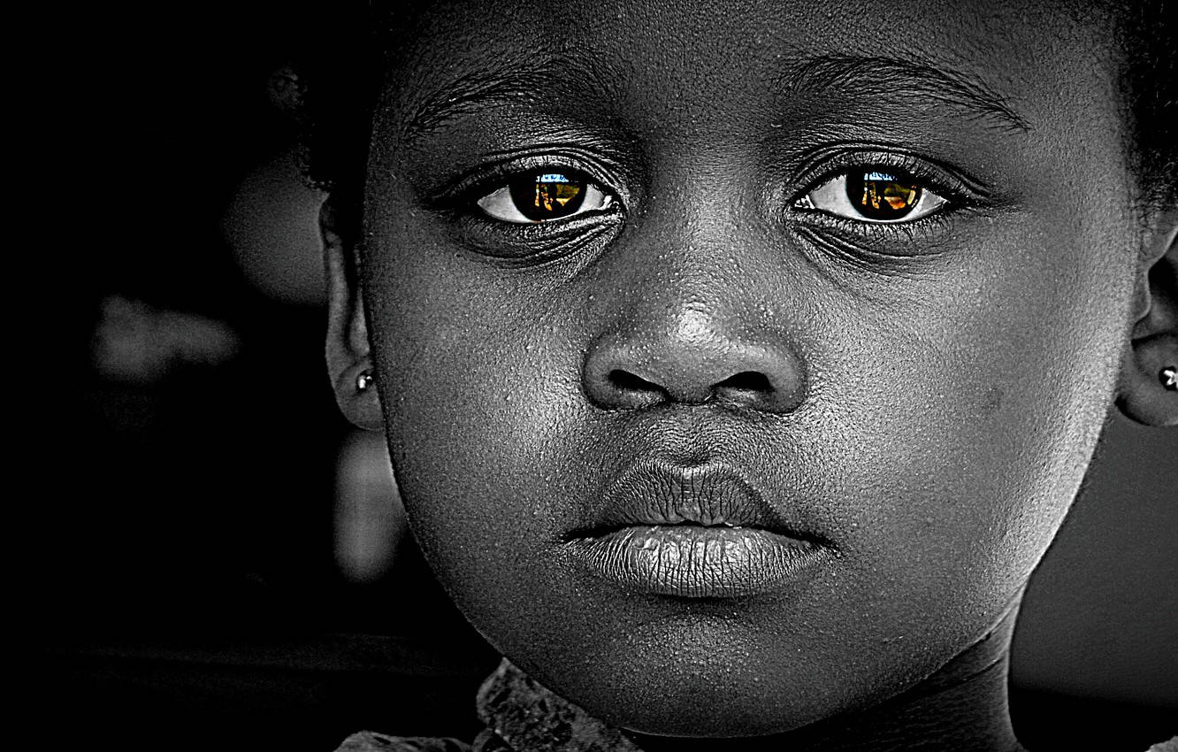 Emotive Portrait Of A Black Girl With Sad Eyes