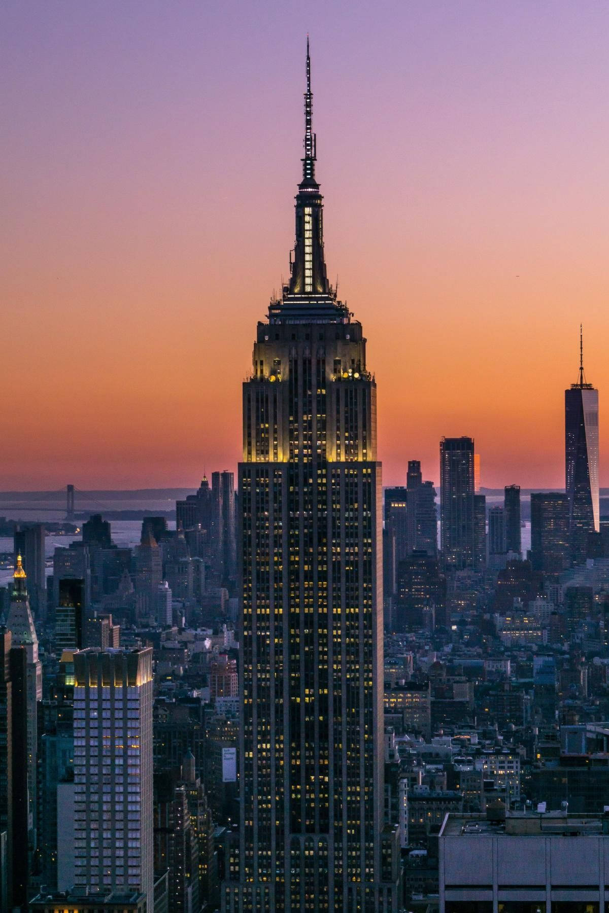Empire State Building With Yellow Lights Background