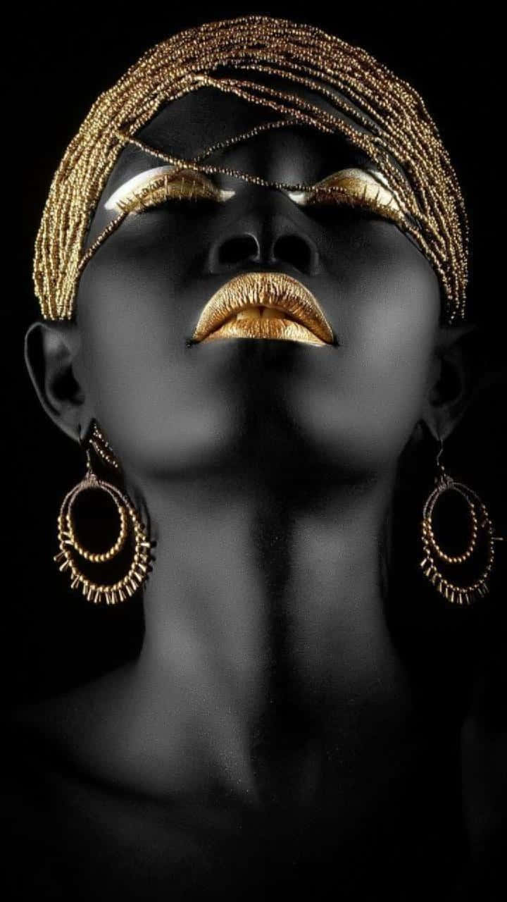 Empowered Nigerian Woman In Traditional Gold Gele