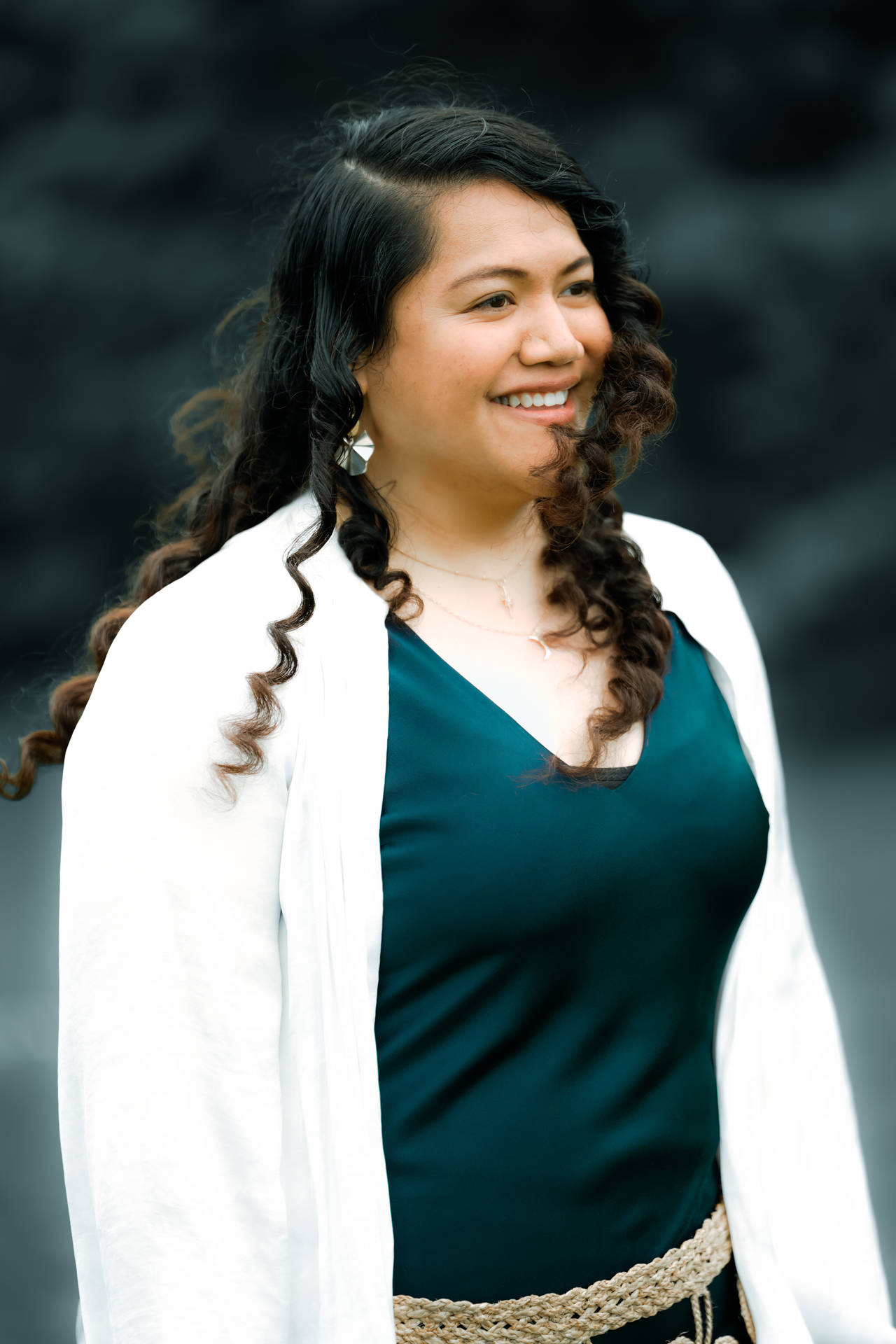 Empowered Plus-size Woman Enjoying The Wind In Her Hair Background