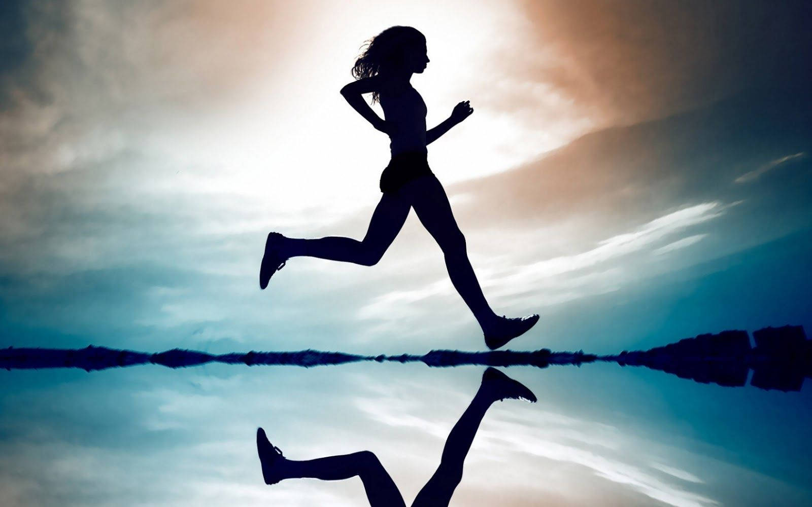 Empowered Woman Running In The Sunshine For Physical Therapy Background