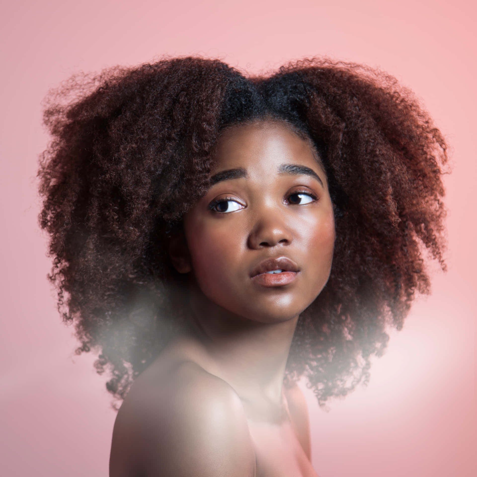 Empowered Young Black Woman With Afro Hair Background