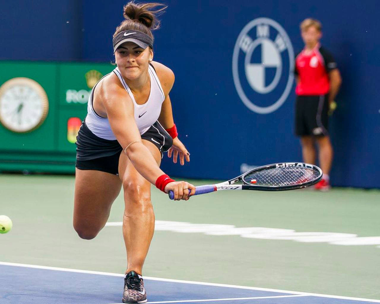 Empowering Stance - Bianca Andreescu At Tennis Court Background