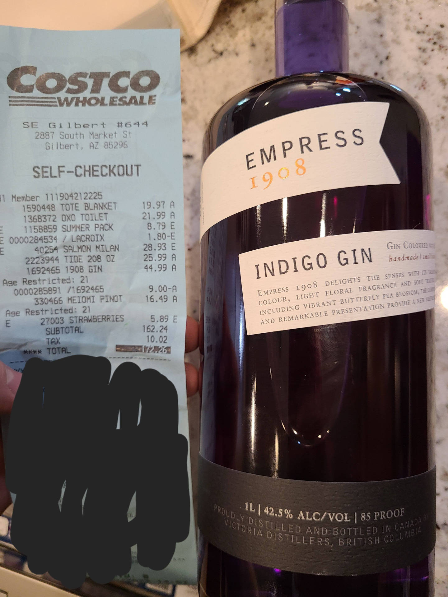 Empress 1908 Gin With Costco Receipt Background