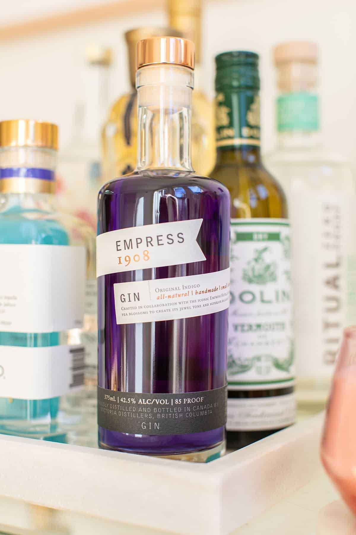 Empress 1908 Gin With Other Alcohol Background