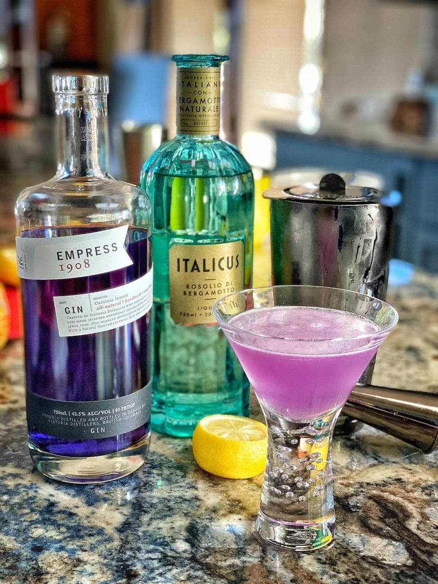 Empress Gin And Italicus With Shot Glass Background