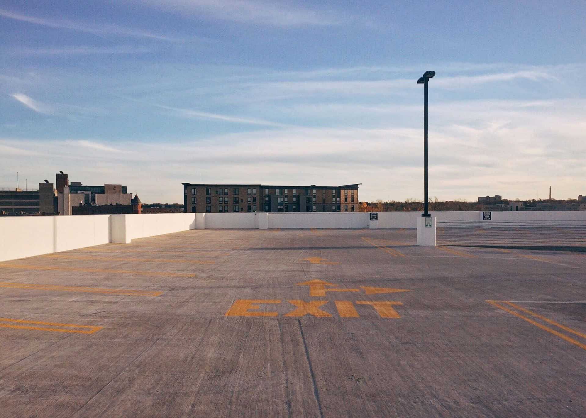 Empty Building Rooftop Parking Lot