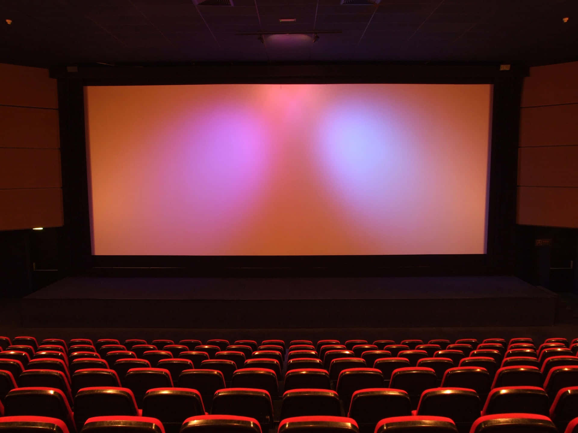 Empty Cinema Hall Red Seats Background
