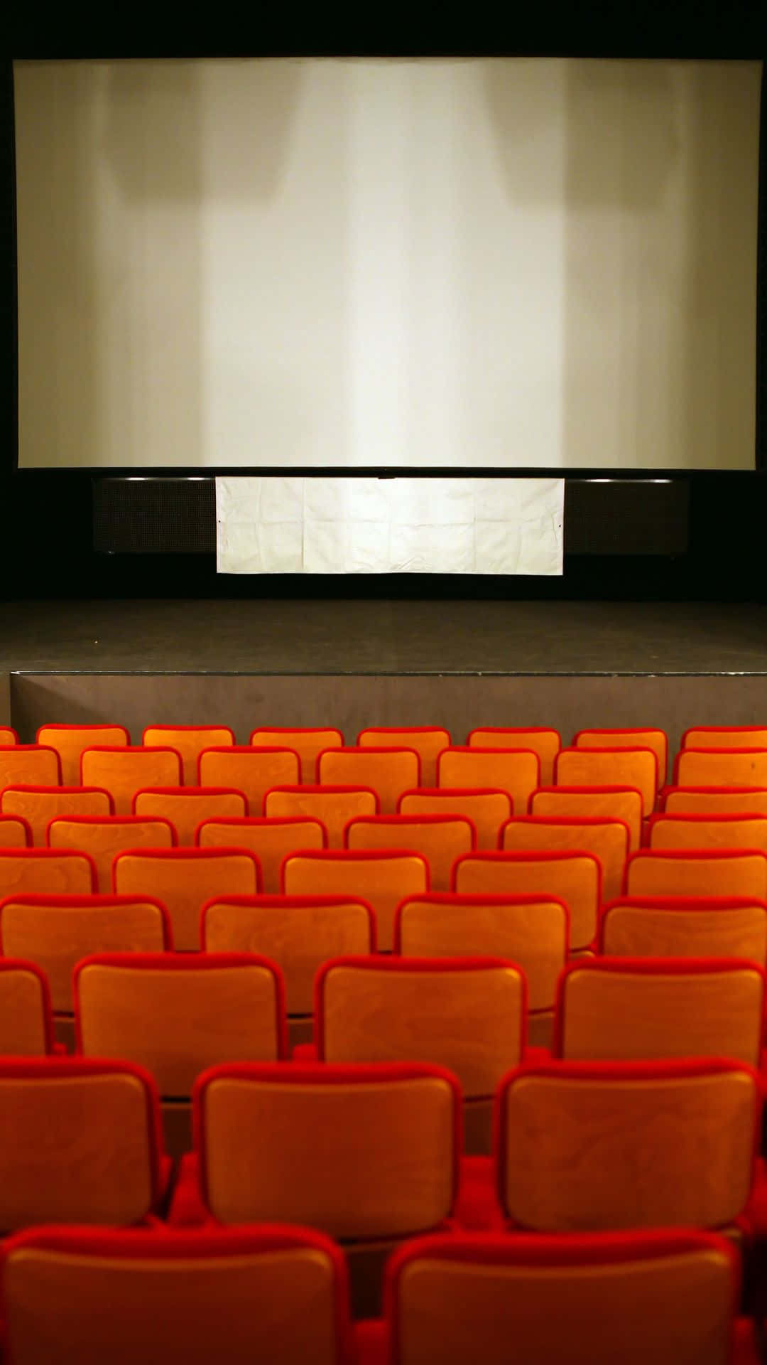 Empty Cinema Hall Red Seats Background