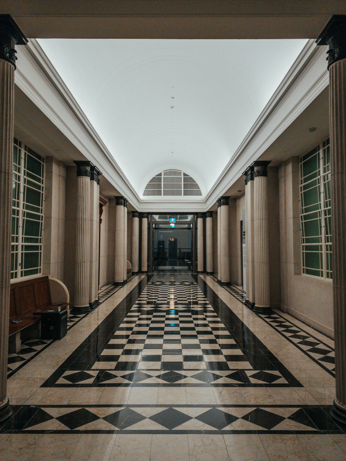 Empty Hallway With Checkered Floor