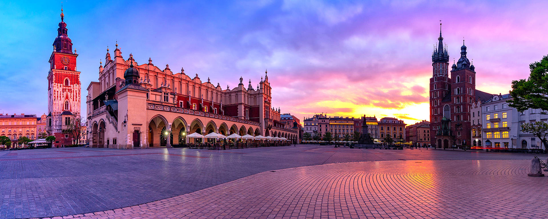 Empty Main Market Square, Krakow Poland On A Sunset Background