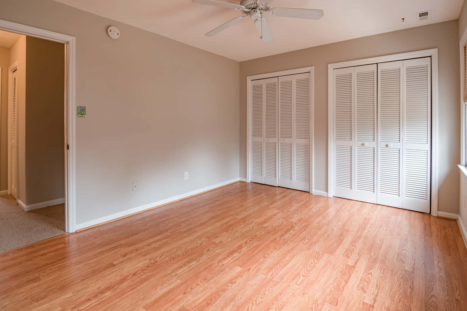 Empty Room With Fan And Cabinets