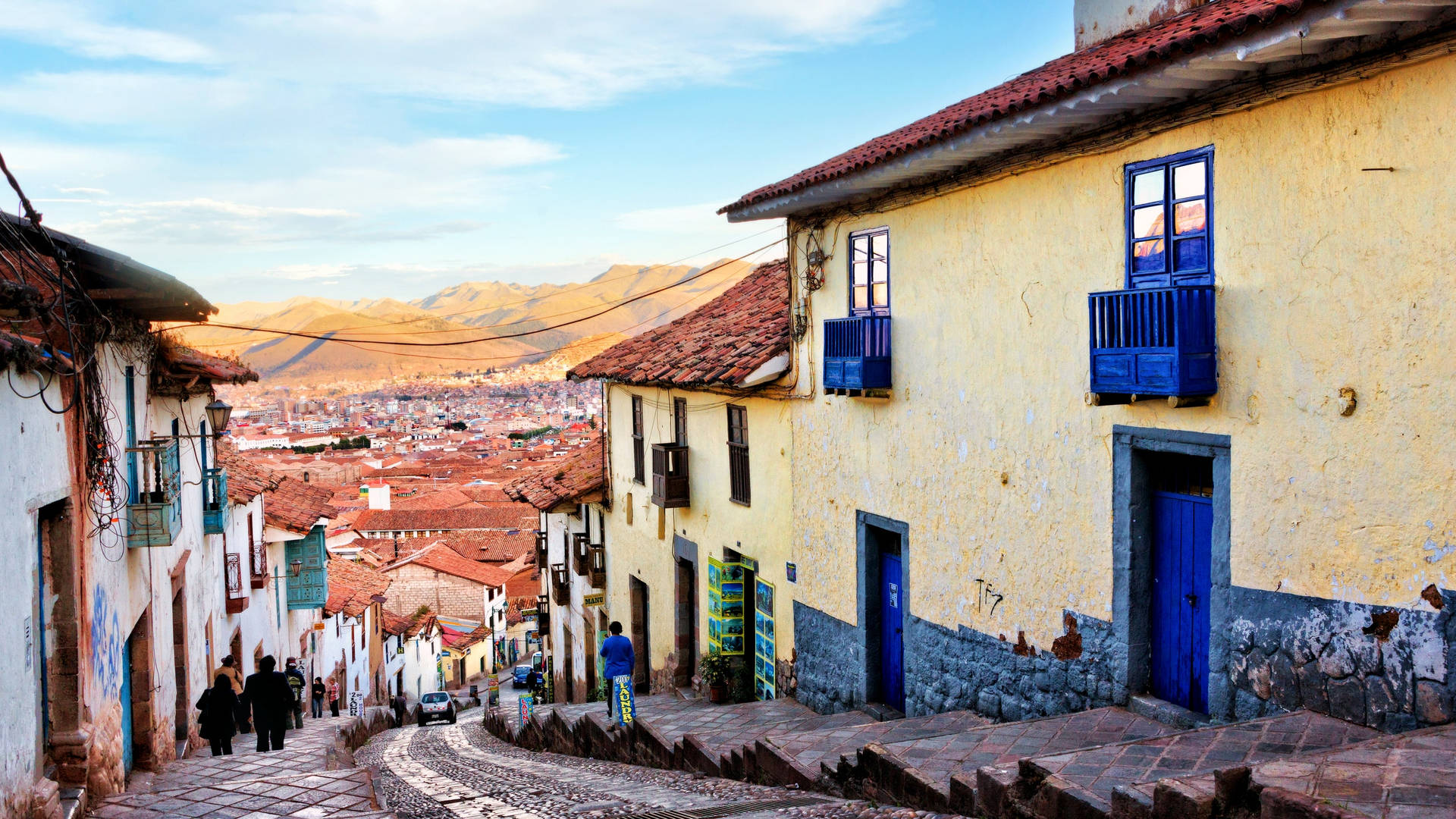 Enchanting Cobblestone Street In Cusco, Peru Background