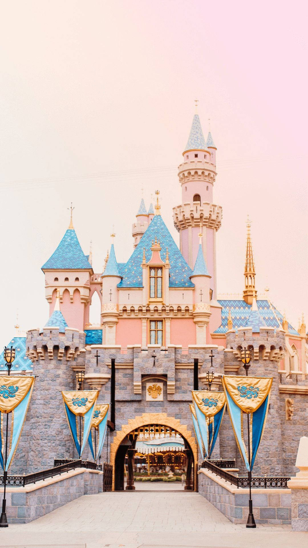 Enchanting Disney Castle Amidst A Mesmerizing Sunset