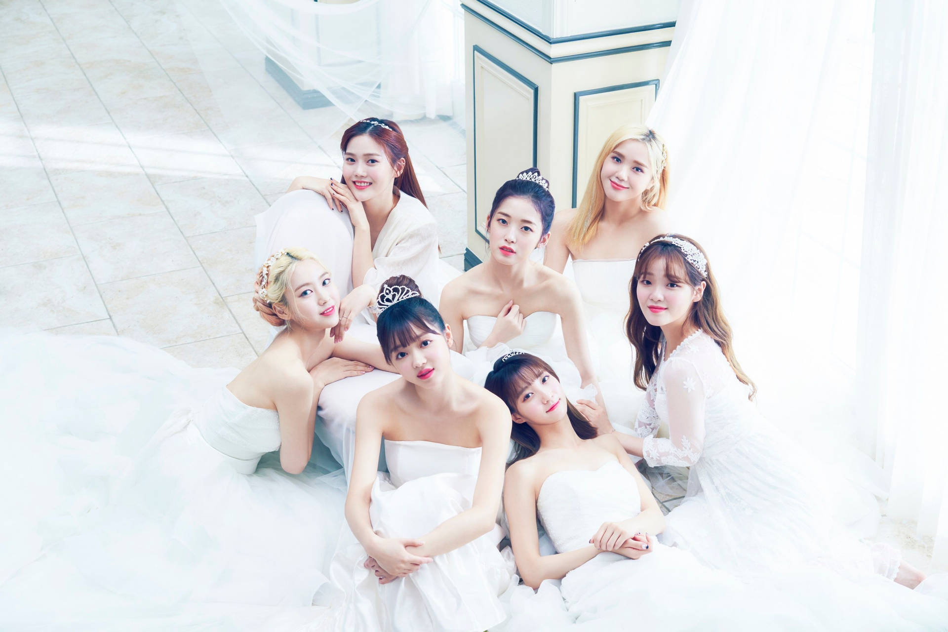 Enchanting Oh My Girl In Ethereal White Gowns Background