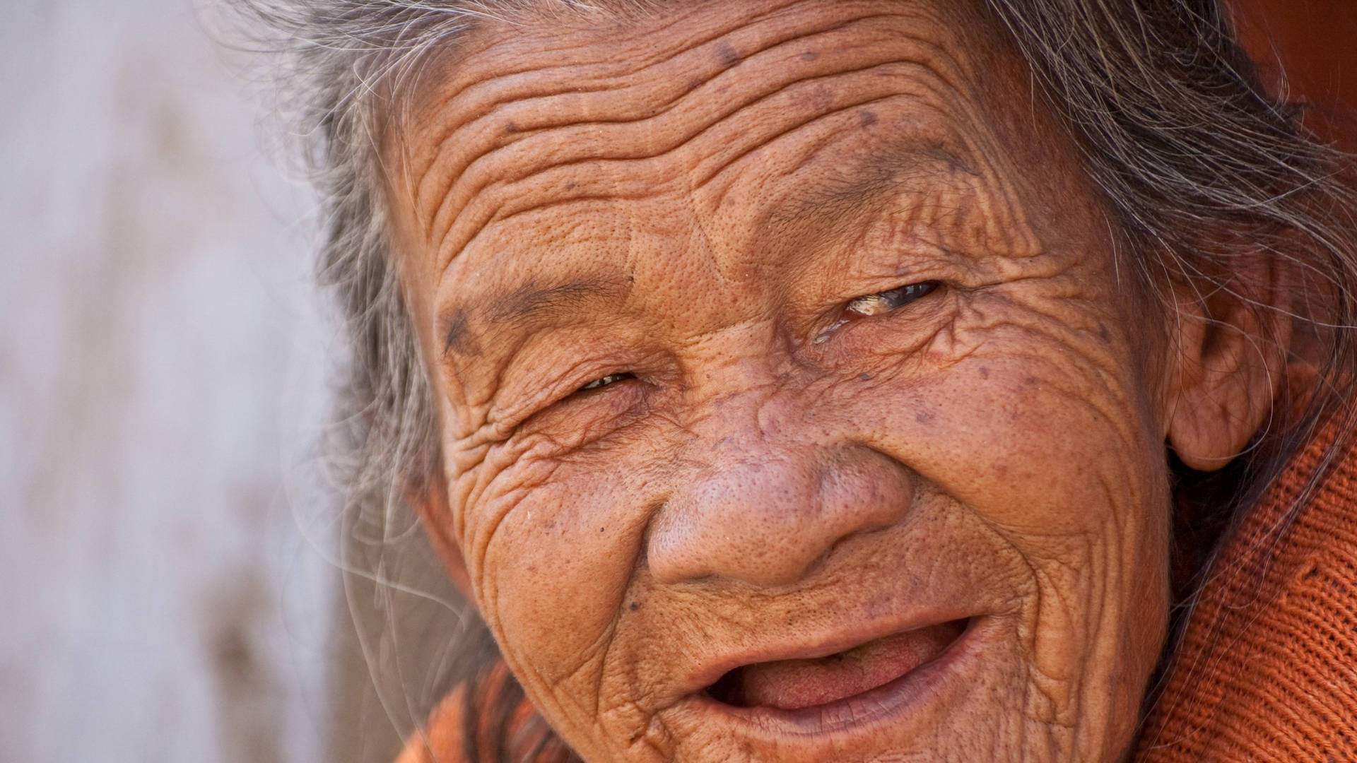 Enchanting Smile Of An Ageless Beauty Background