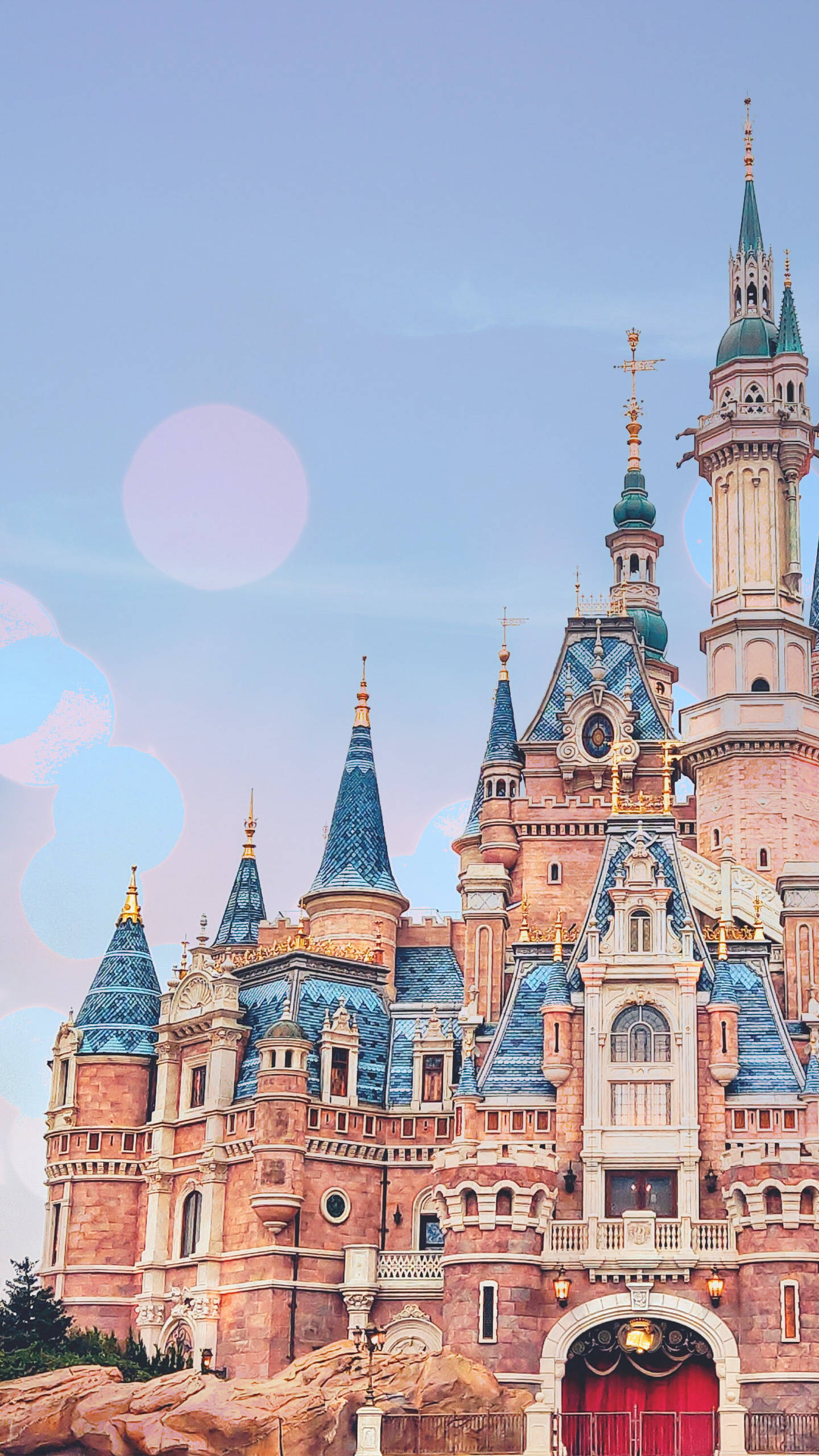 Enchanting View Of Shanghai Disneyland Castle In Pink Background