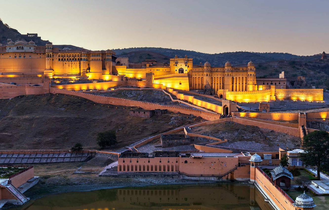 Enchanting View Of The Illuminated Amber Palace - Jaipur Background