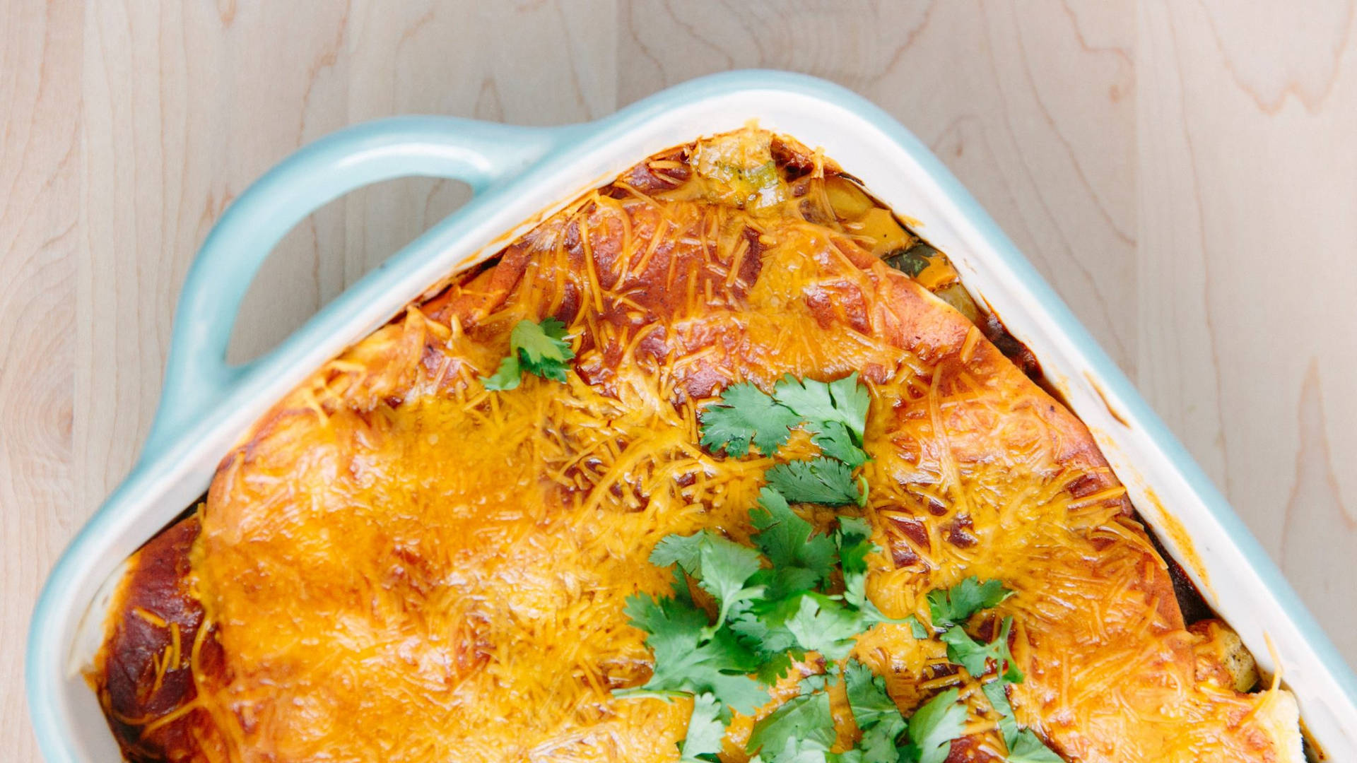 Enchiladas White Dish With Cheesy Salsa Background