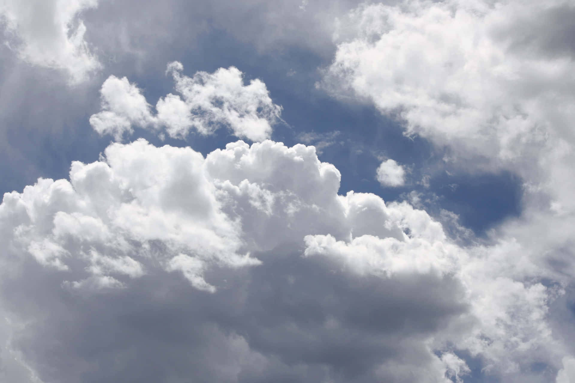 Endless Whites Skies Surrounding By Beautiful White Clouds Background