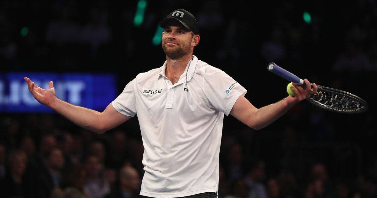 Energetic Andy Roddick Celebrating Victory On The Tennis Court