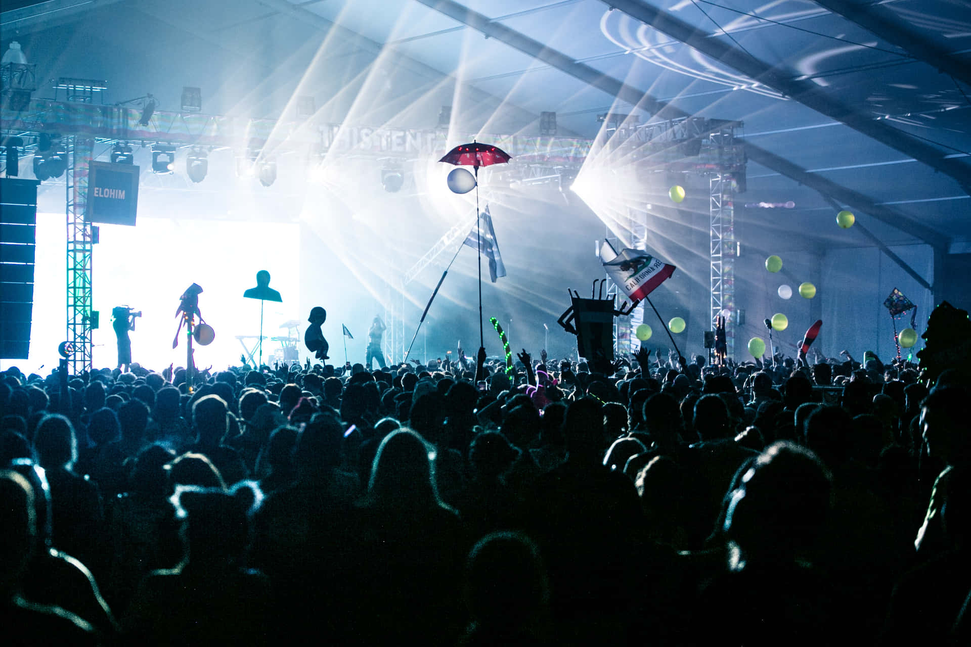 Energetic Crowd At Music Festival Background