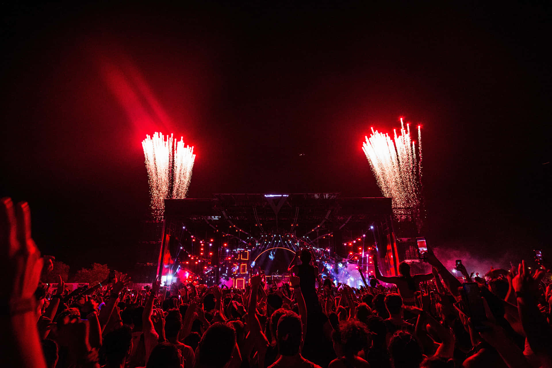 Energetic Music Festival Crowd Background