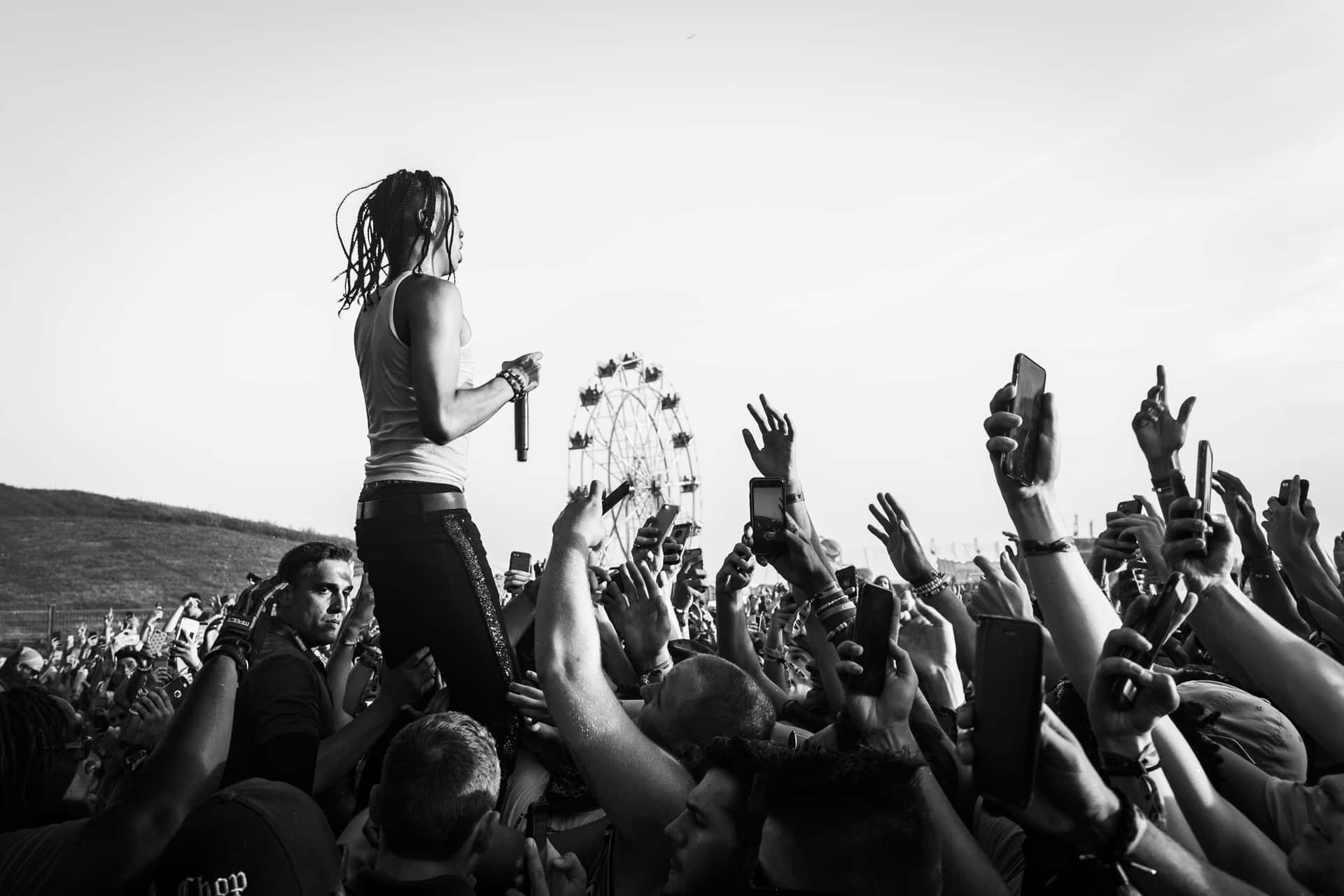 Energetic Music Festival Crowd Background