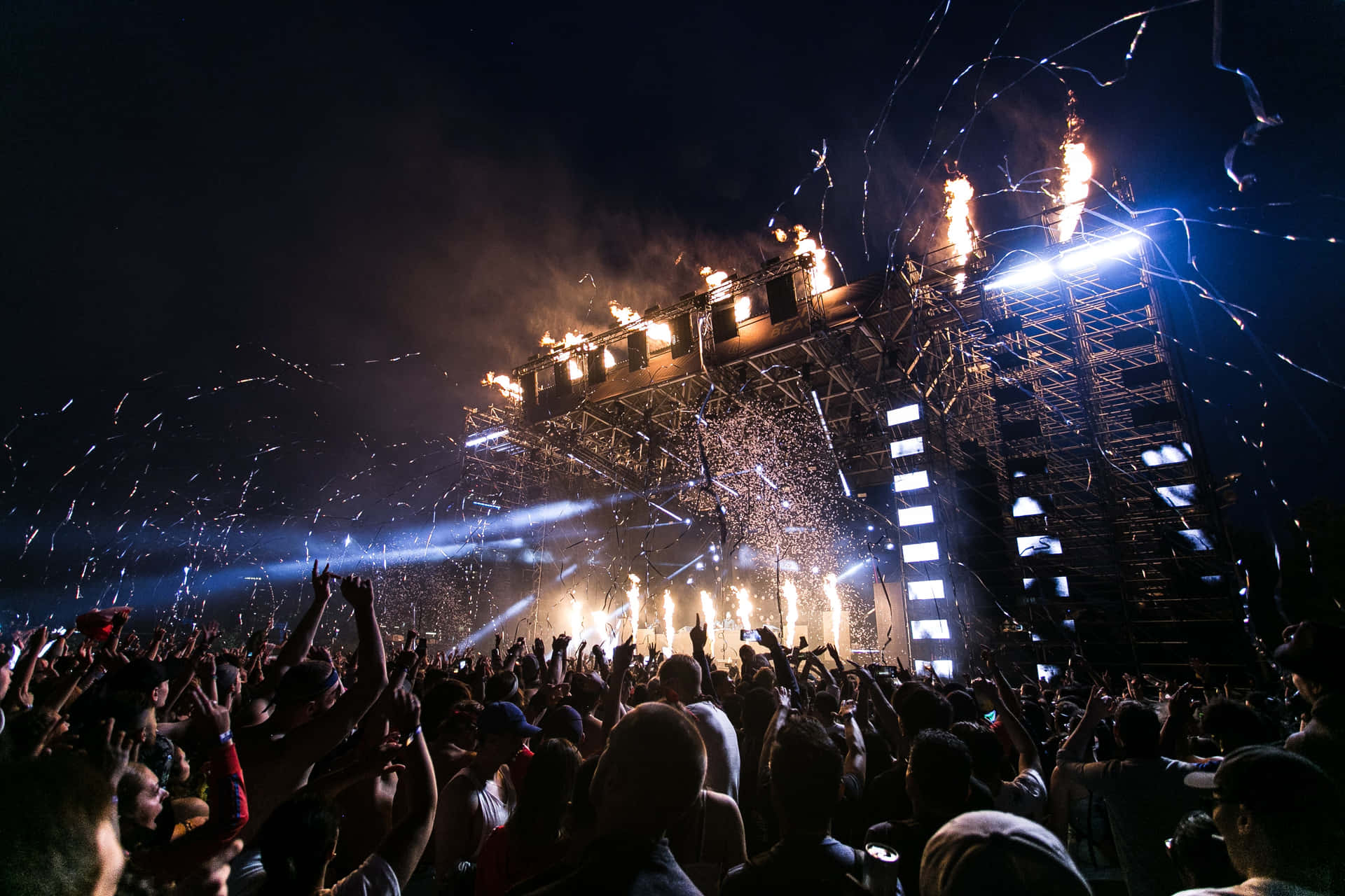 Energetic Music Festival Crowd Background