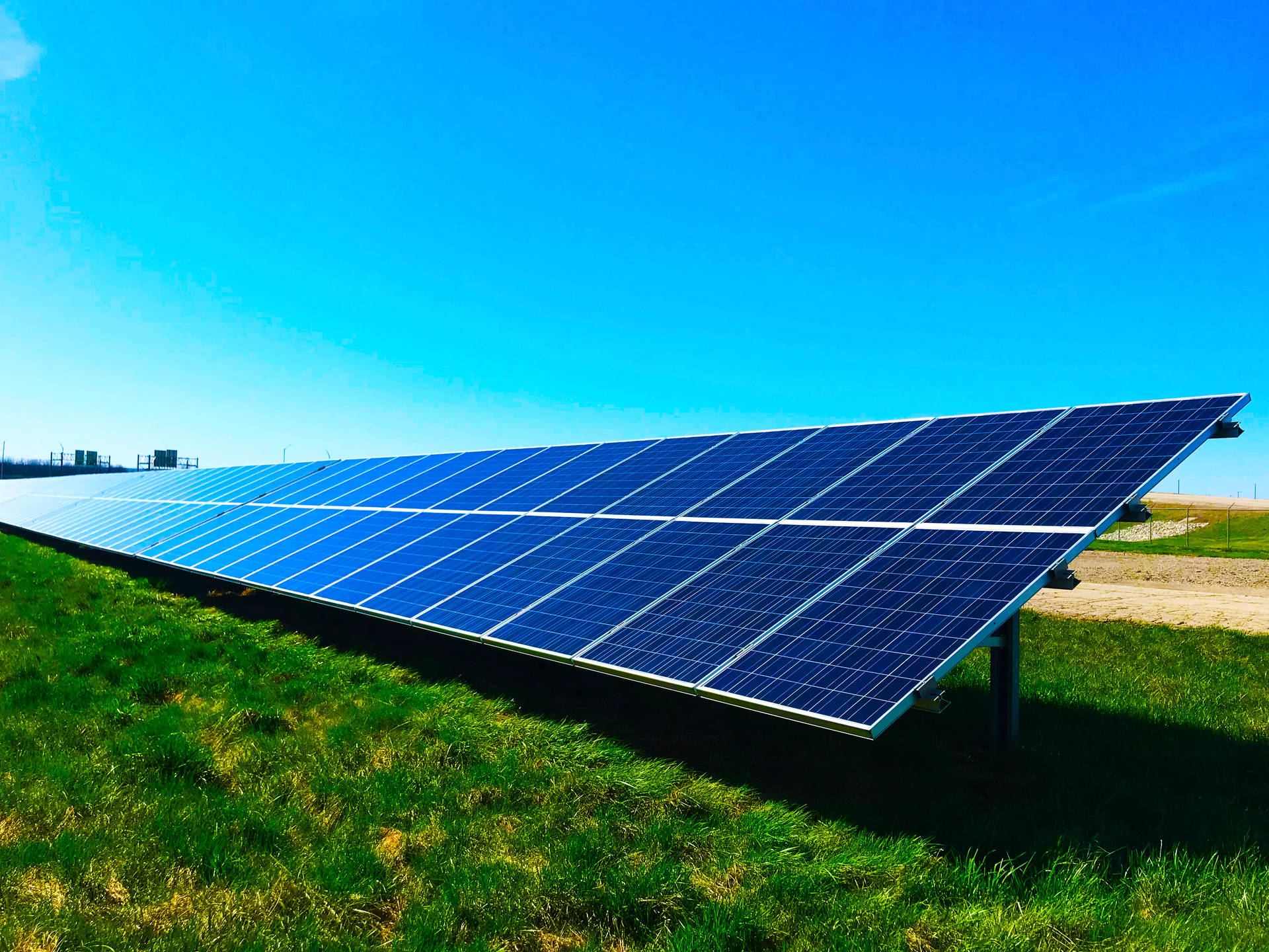Energy Solar Panels On Field Background