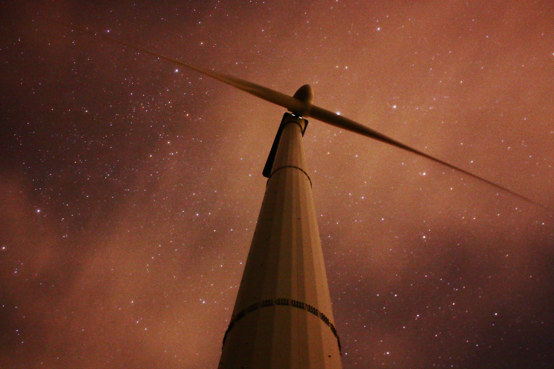 Energy Windmill Under Night Sky Background