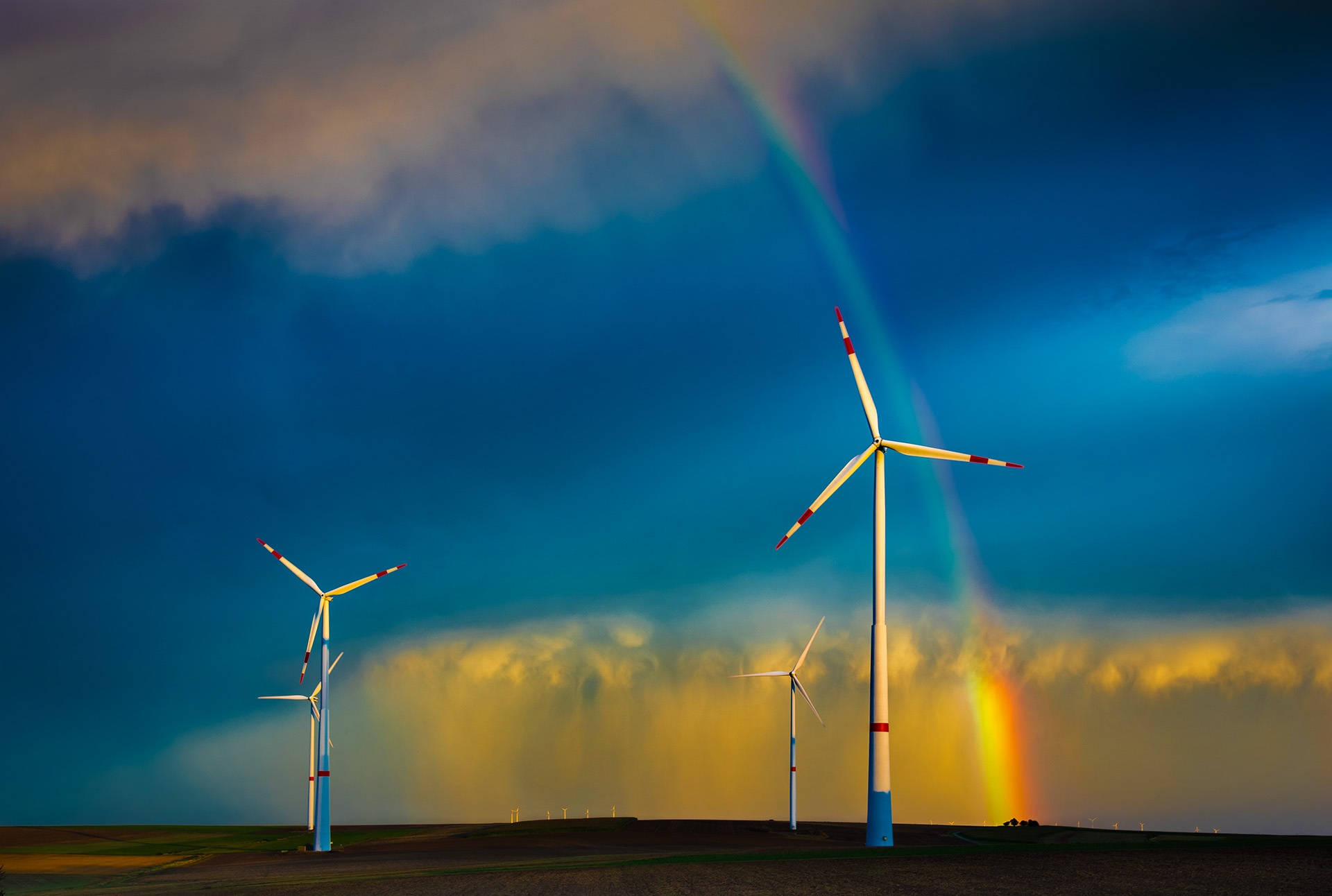 Energy Windmills And Rainbow