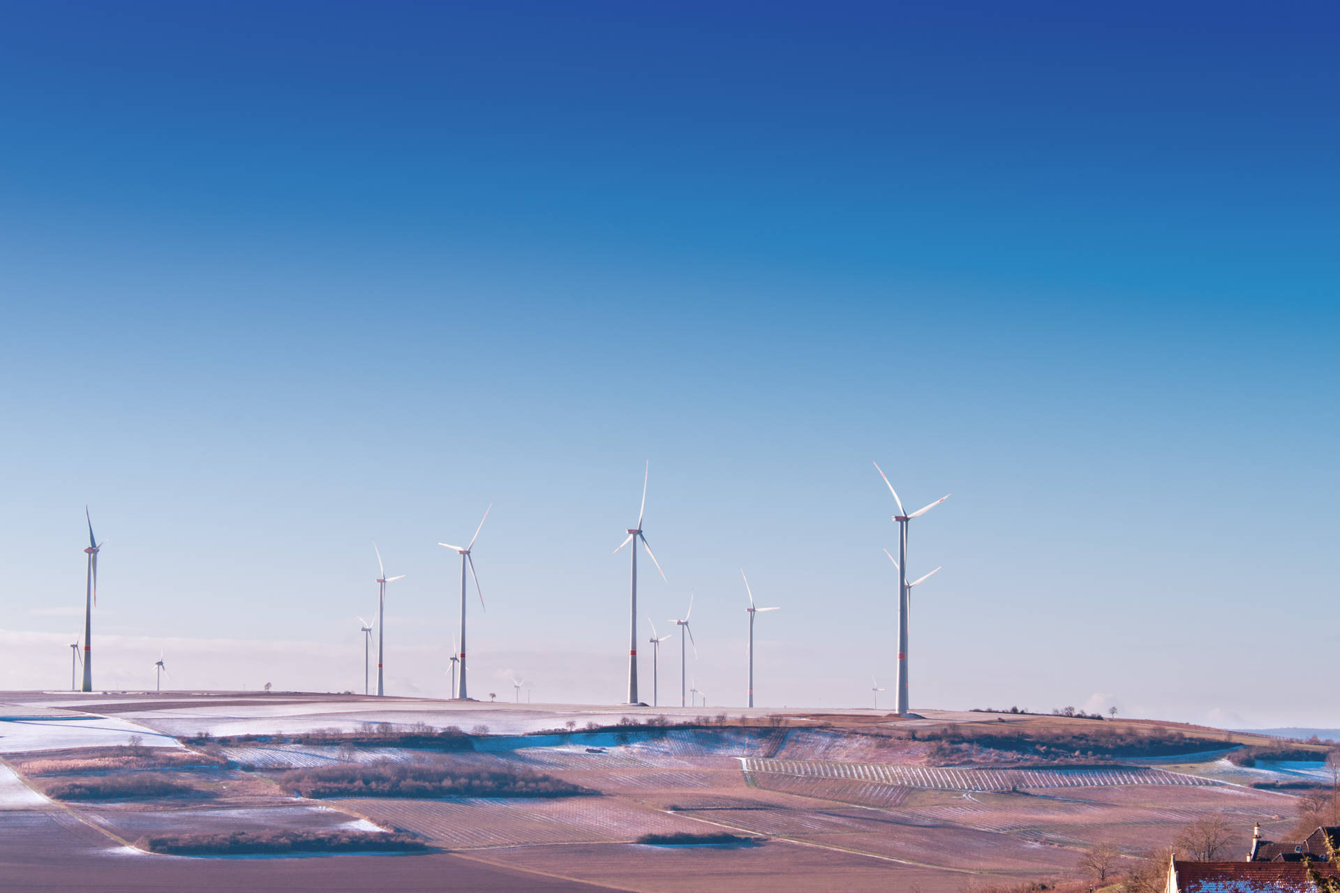 Energy Windmills In The Desert Background