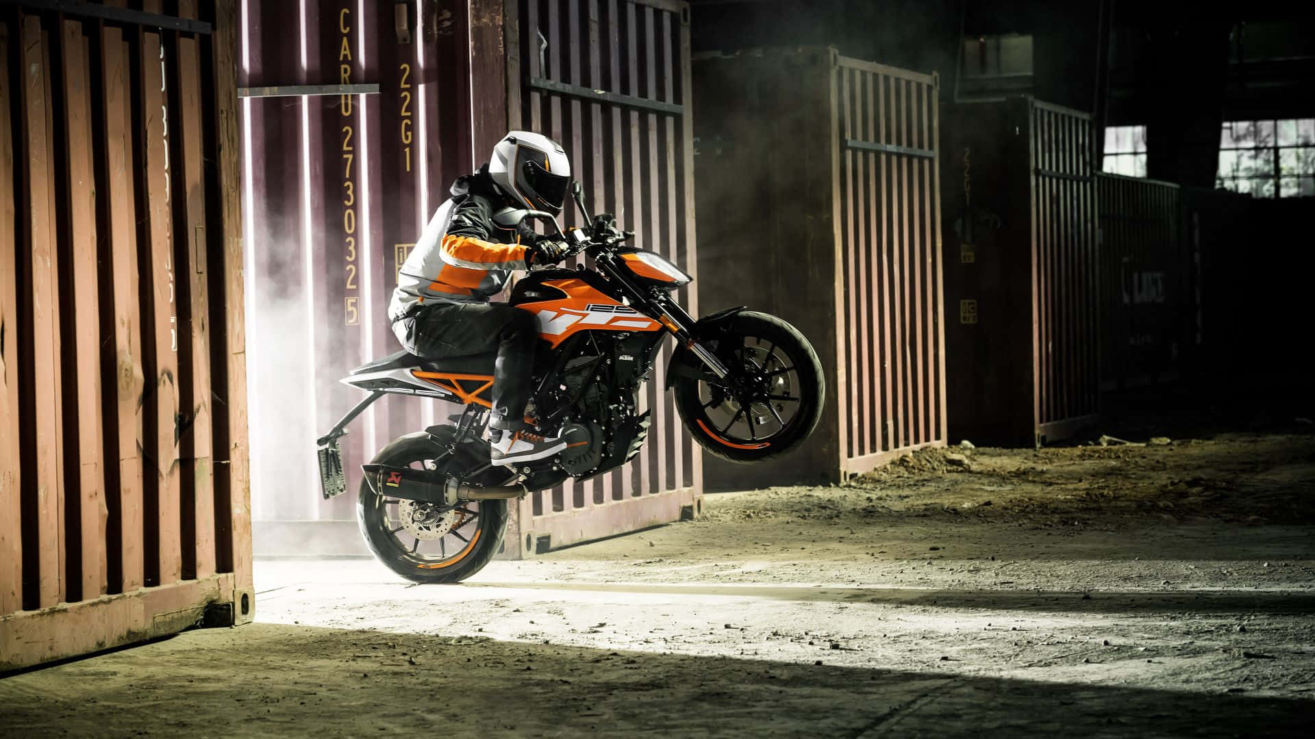 Engaging Ride With The Dynamic Ktm Sports Bike Background